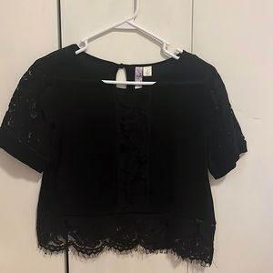 Francesca’s black lace cropped blouse